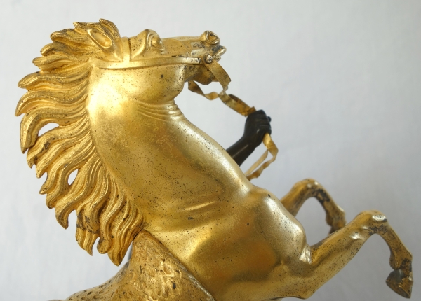 An ormolu and patinated bronze Marly Horse after Coustou - early 19th century