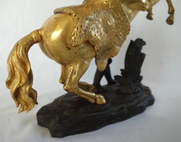 An ormolu and patinated bronze Marly Horse after Coustou - early 19th century