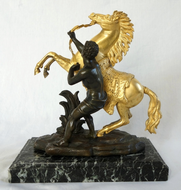 An ormolu and patinated bronze Marly Horse after Coustou - early 19th century