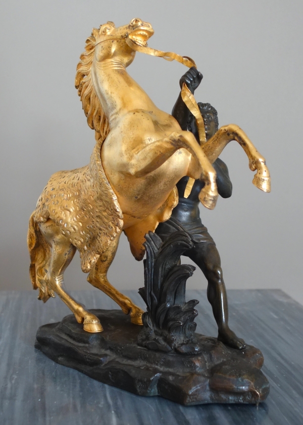 An ormolu and patinated bronze Marly Horse after Coustou - early 19th century