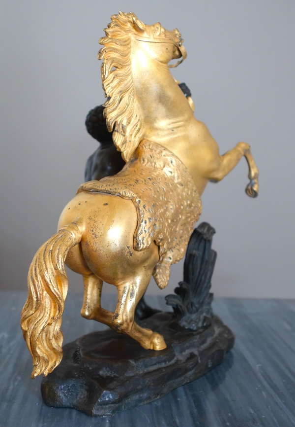 An ormolu and patinated bronze Marly Horse after Coustou - early 19th century