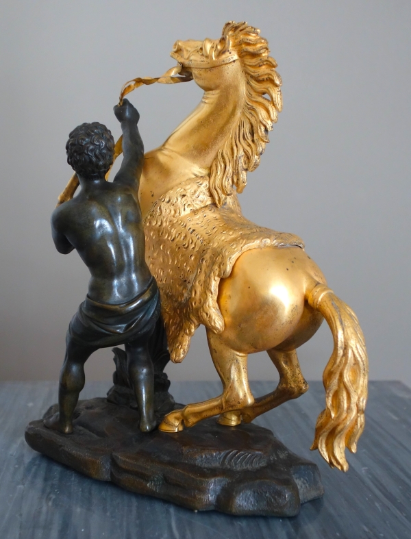 An ormolu and patinated bronze Marly Horse after Coustou - early 19th century