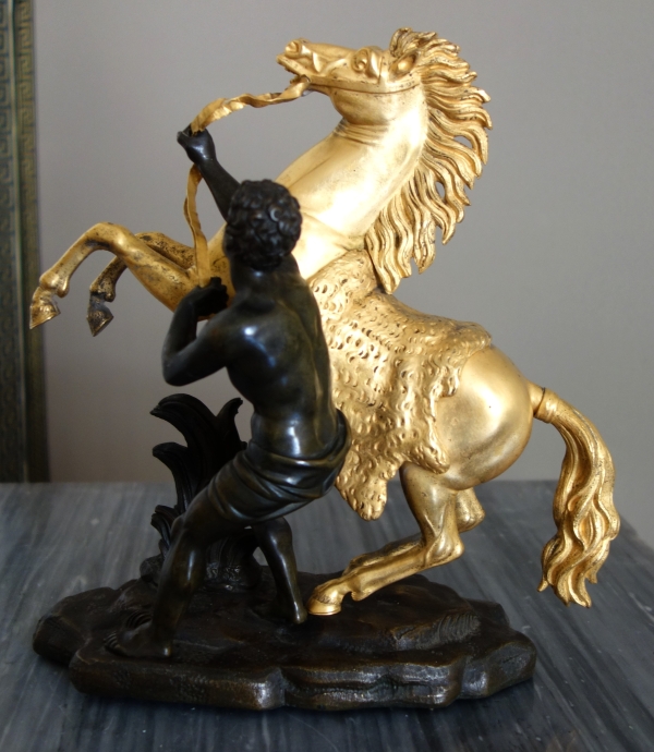 An ormolu and patinated bronze Marly Horse after Coustou - early 19th century