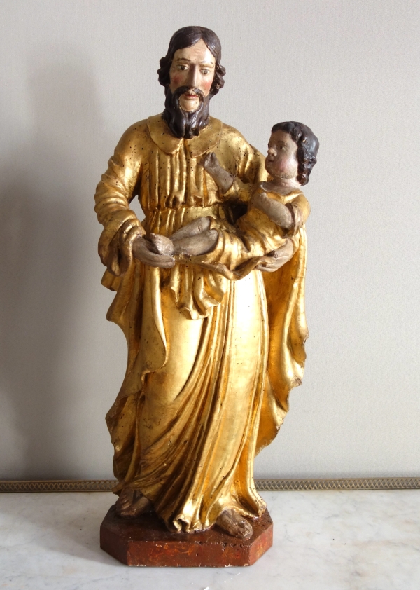 Saint Joseph et l'enfant Jésus : statue en bois doré - Alsace, XVIIe siècle - 72cm