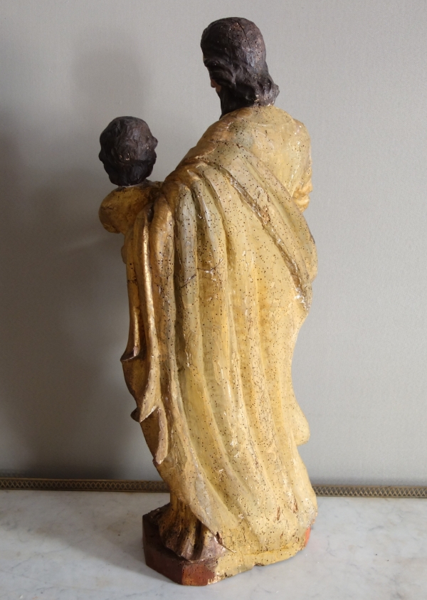 Saint Joseph et l'enfant Jésus : statue en bois doré - Alsace, XVIIe siècle - 72cm