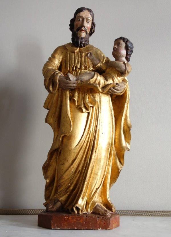 Saint Joseph et l'enfant Jésus : statue en bois doré - Alsace, XVIIe siècle - 72cm