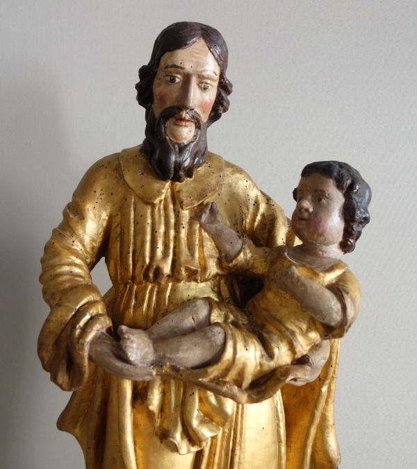 Saint Joseph et l'enfant Jésus : statue en bois doré - Alsace, XVIIe siècle - 72cm