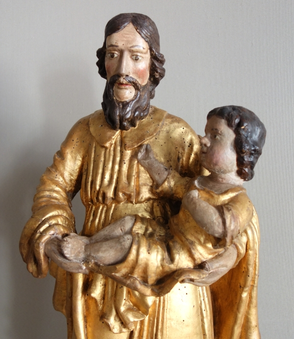 Saint Joseph et l'enfant Jésus : statue en bois doré - Alsace, XVIIe siècle - 72cm