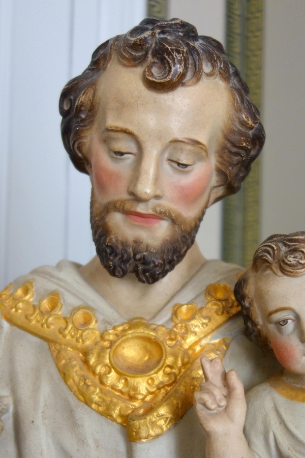 Tall polychromatic and gilt plaster statue of St Joseph holding Jesus Child - 19th century