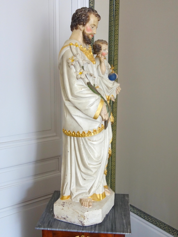 Tall polychromatic and gilt plaster statue of St Joseph holding Jesus Child - 19th century