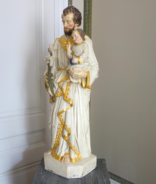 Tall polychromatic and gilt plaster statue of St Joseph holding Jesus Child - 19th century