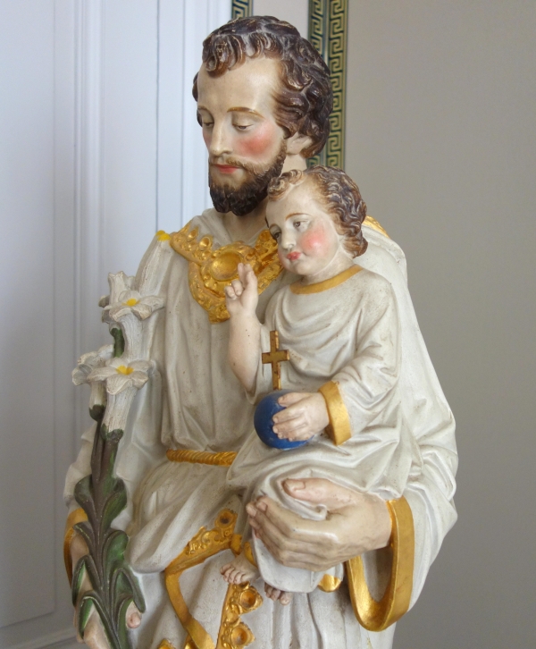 Tall polychromatic and gilt plaster statue of St Joseph holding Jesus Child - 19th century