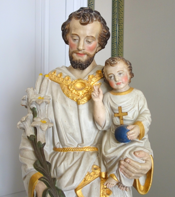 Tall polychromatic and gilt plaster statue of St Joseph holding Jesus Child - 19th century