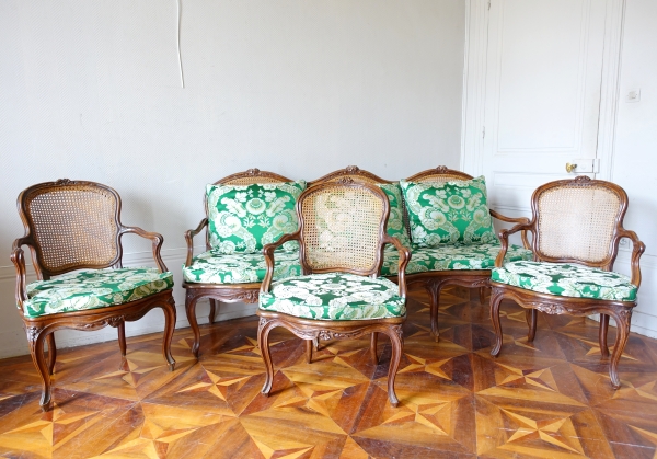 Louis XV walnut canned cabriolet armchair, 18th century