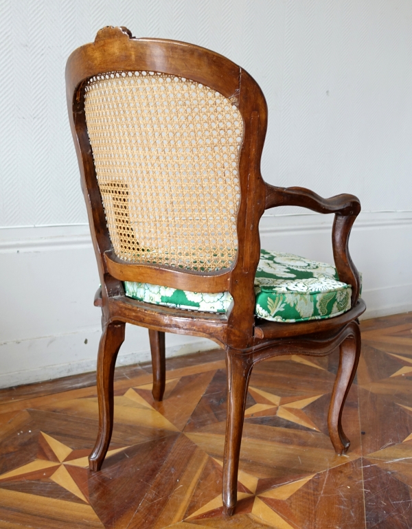 Louis XV walnut canned cabriolet armchair, 18th century