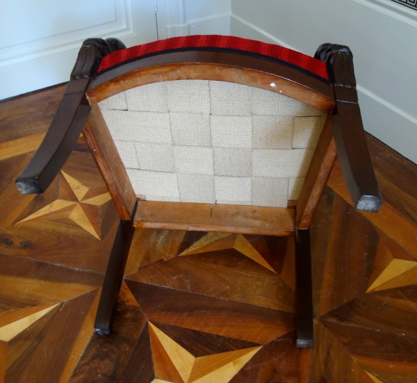 Empire mahogany armchair, dolphin-shaped armrests, early 19th century