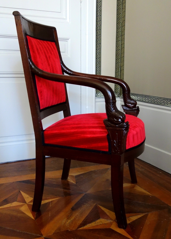 Empire mahogany armchair, dolphin-shaped armrests, early 19th century
