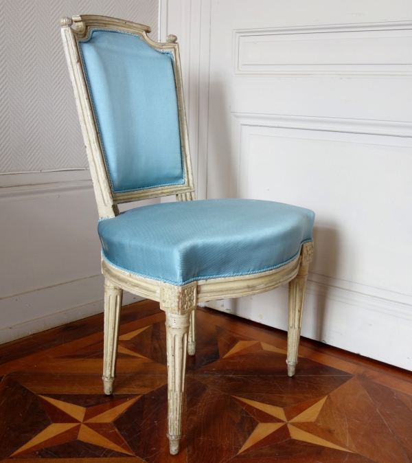 Pair of Louis XVI lacquered cabriolet chairs, light blue silk cover