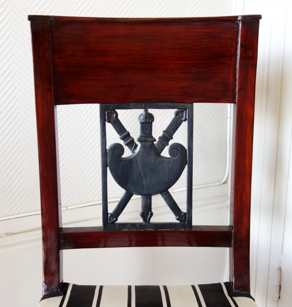 Pair of Empire mahogany chairs, gladius sword on the backrest, 19th century circa 1800