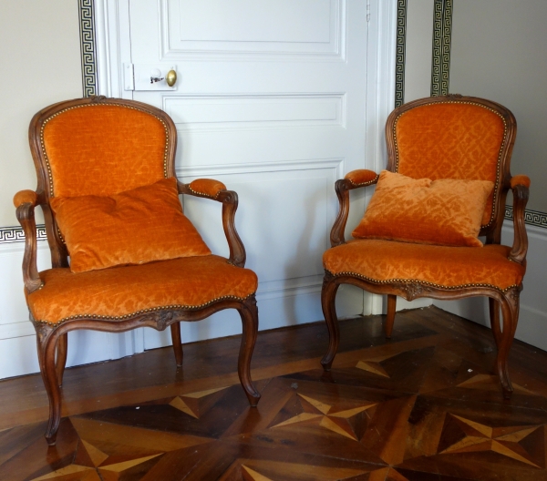 Pair of Louis XV walnut cabriolet armchairs, 18th century
