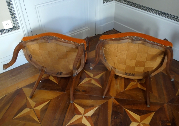 Pair of Louis XV walnut cabriolet armchairs, 18th century