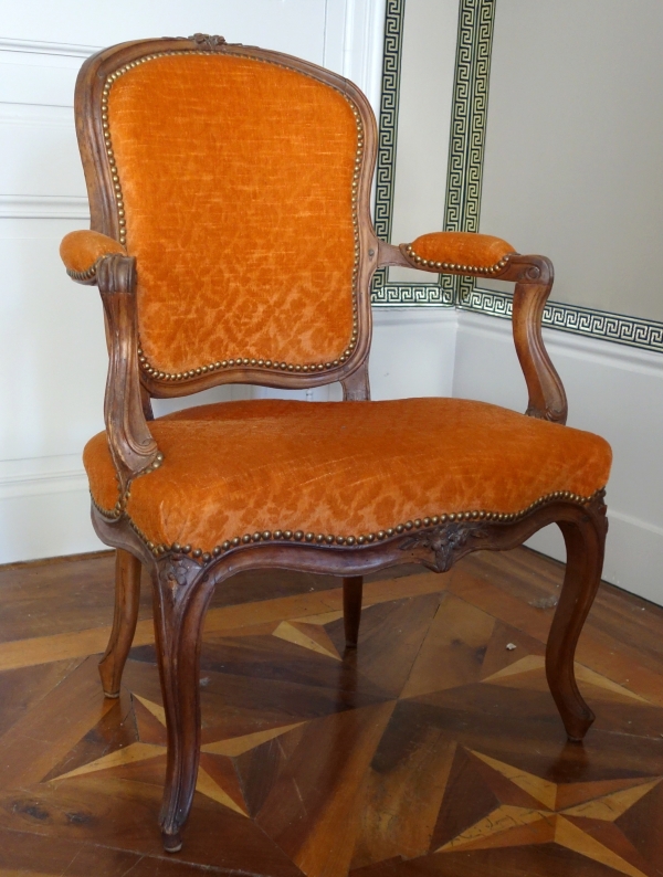Pair of Louis XV walnut cabriolet armchairs, 18th century