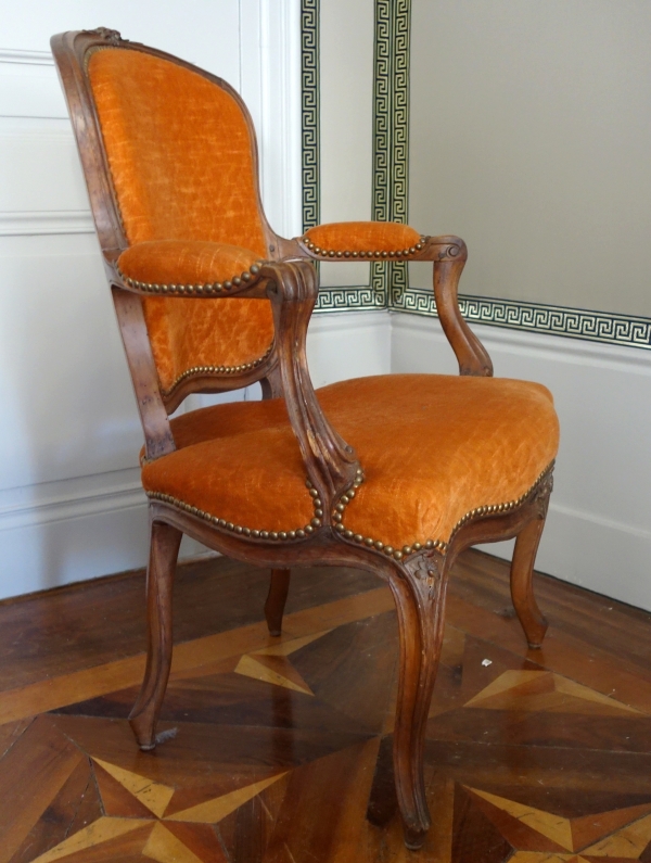 Pair of Louis XV walnut cabriolet armchairs, 18th century