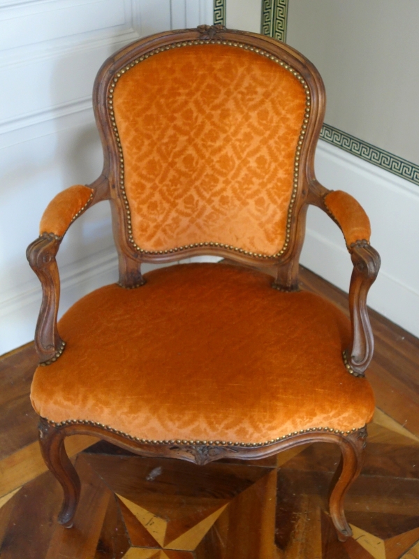 Pair of Louis XV walnut cabriolet armchairs, 18th century