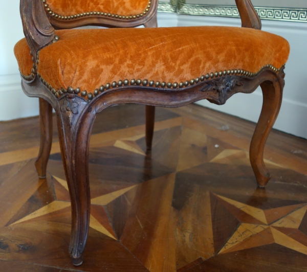 Pair of Louis XV walnut cabriolet armchairs, 18th century