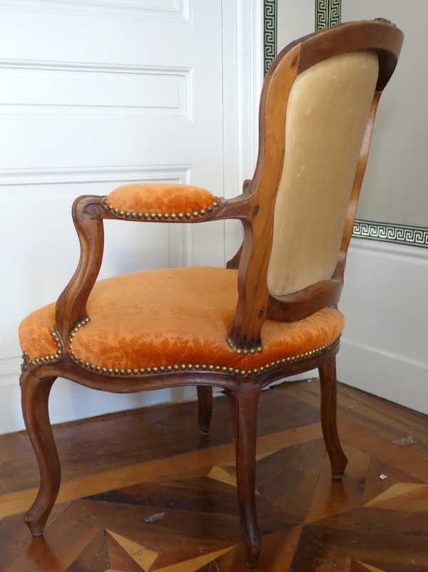 Pair of Louis XV walnut cabriolet armchairs, 18th century