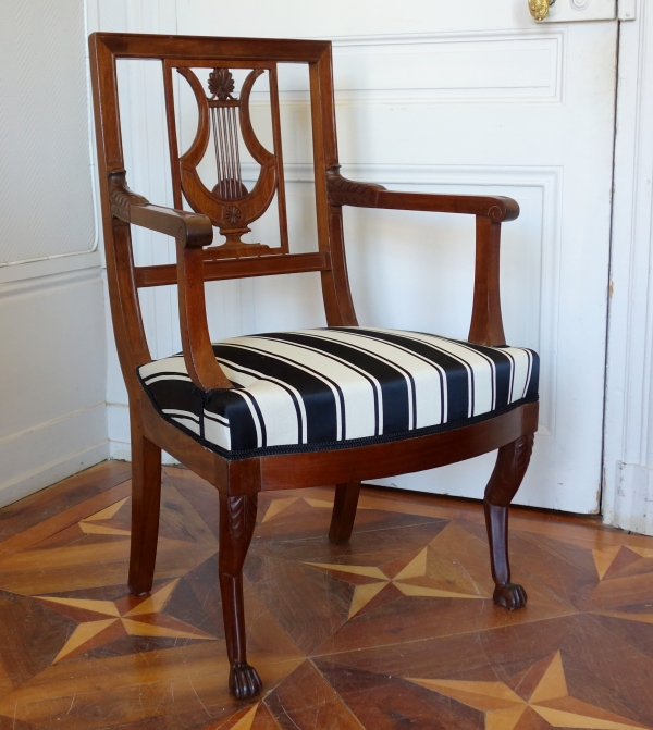 Paire de fauteuils d'époque Directoire en acajou, dossier lyre et pieds griffes, époque fin XVIIIe siècle