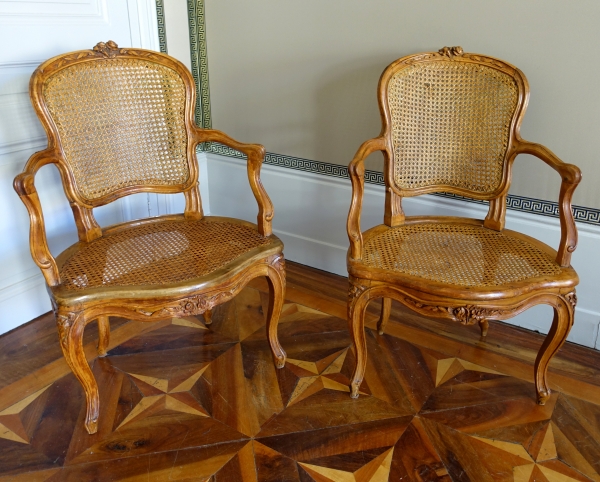 Pair of Louis XV wallnut cane armchairs - follower of Nogaret