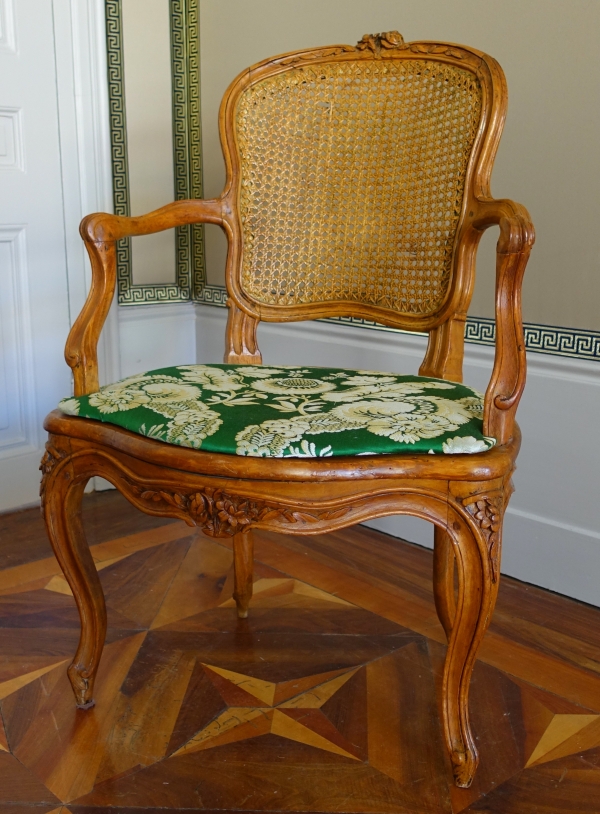 Pair of Louis XV wallnut cane armchairs - follower of Nogaret