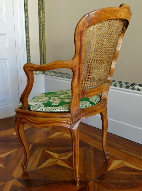 Pair of Louis XV wallnut cane armchairs - follower of Nogaret