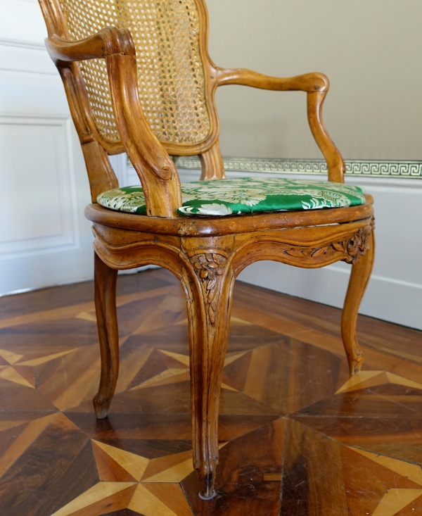 Pair of Louis XV wallnut cane armchairs - follower of Nogaret
