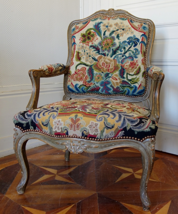 Pair of Louis XV style armchairs covered with 18th century tapestries