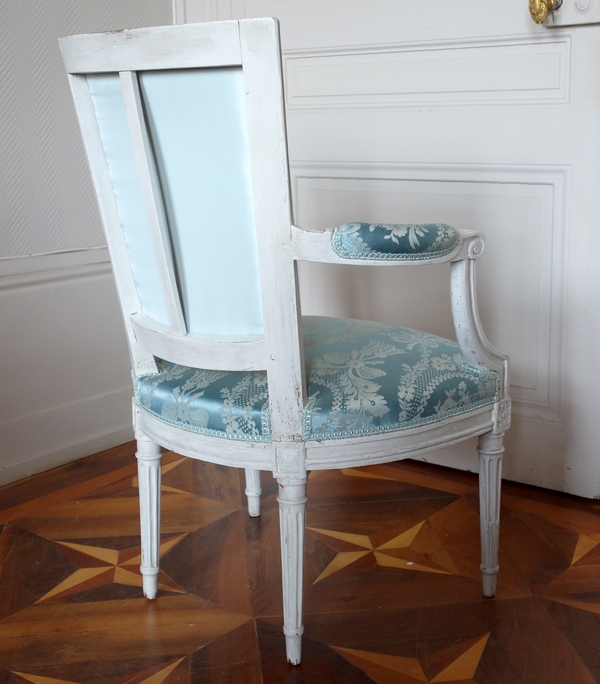Salon de 4 fauteuils cabriolets d'époque Louis XVI à dossier en fer de pelle - travail parisien