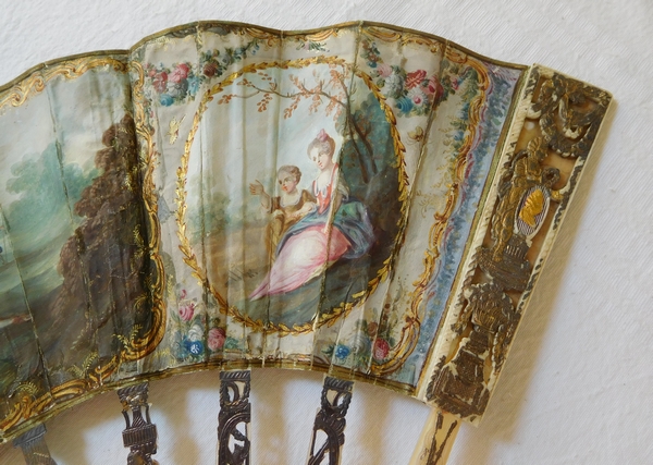 Louis XVI mother of pearl and gouache fan set into its gilt wood frame box