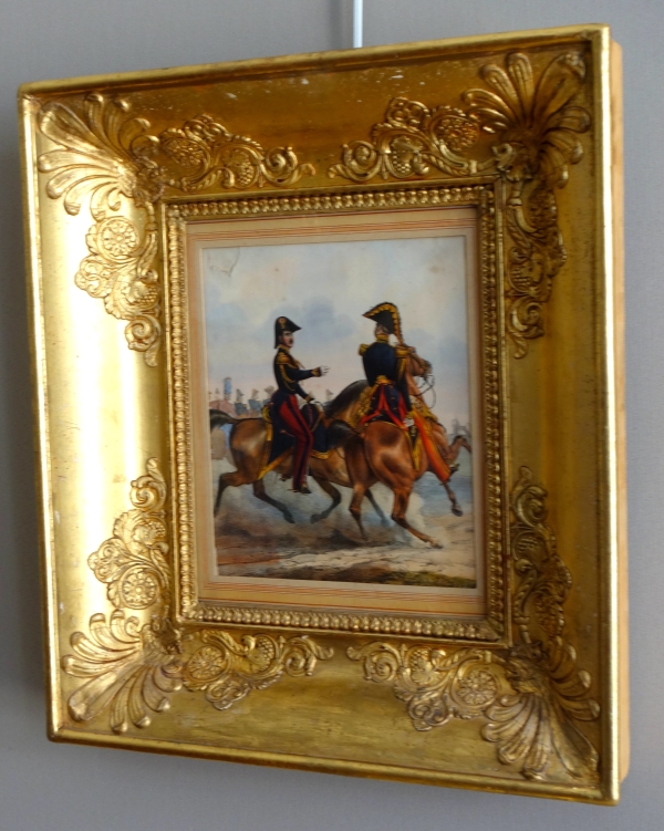 19th century engraving showing French officers riding their hors circa 1830, gold leaf gilt wood