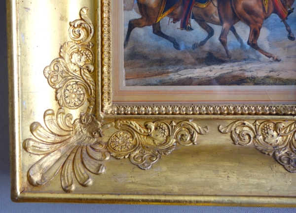 19th century engraving showing French officers riding their hors circa 1830, gold leaf gilt wood