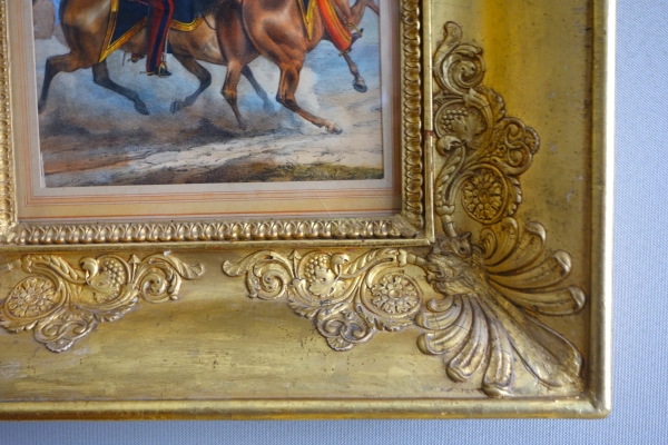 19th century engraving showing French officers riding their hors circa 1830, gold leaf gilt wood