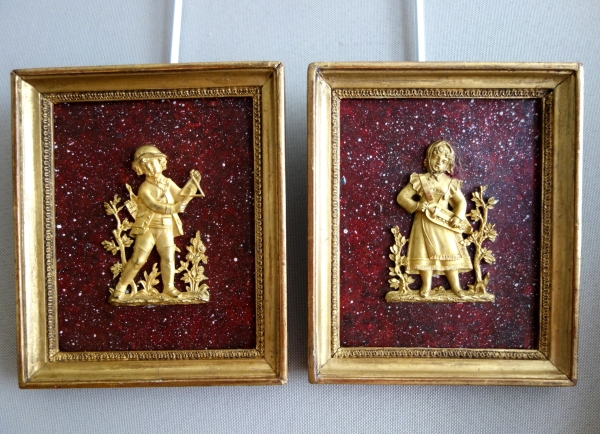 Pair of miniature ormolu characters, faux porphyry marble background - 19th century