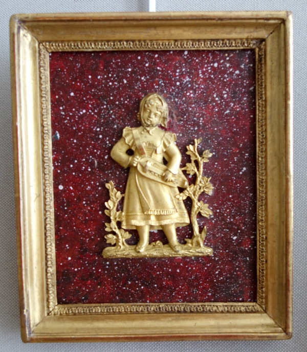 Pair of miniature ormolu characters, faux porphyry marble background - 19th century