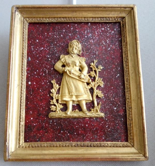 Pair of miniature ormolu characters, faux porphyry marble background - 19th century
