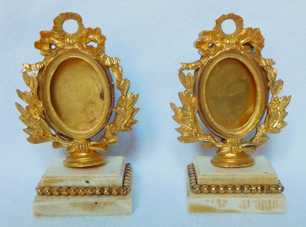 Pair of ormolu and ivory miniature frames - Louis XVI style, mid 19th century