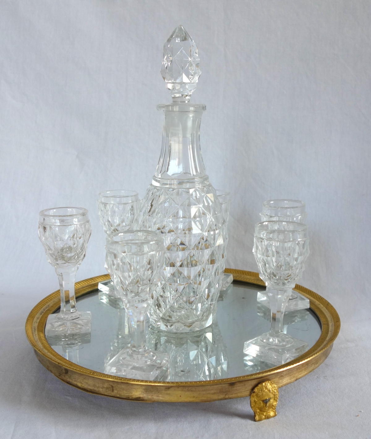 Détail — Empire Le Creusot crystal liquor set, ormolu framed tray