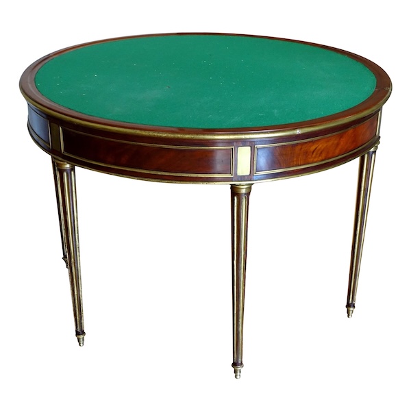 Mahogany half moon shaped game table, Louis XVI period, late 18th century
