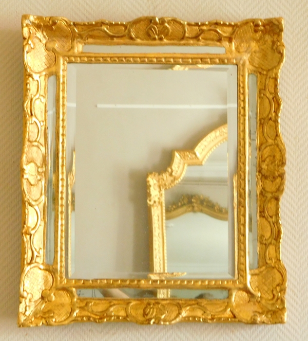 Détail — Miroir à pare-closes en bois doré, glace au mercure, époque Louis XIV Régence 48cm x 56cm