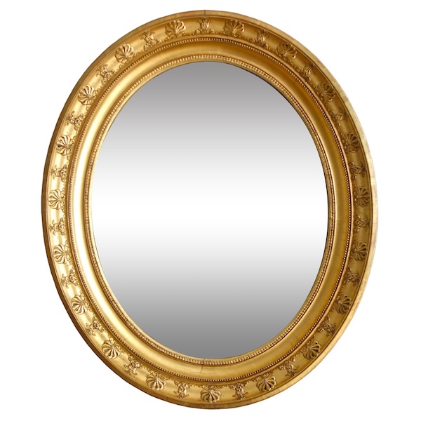 Grand miroir ovale d'époque Empire en bois doré feuille d'or - 78cm x 65,3cm