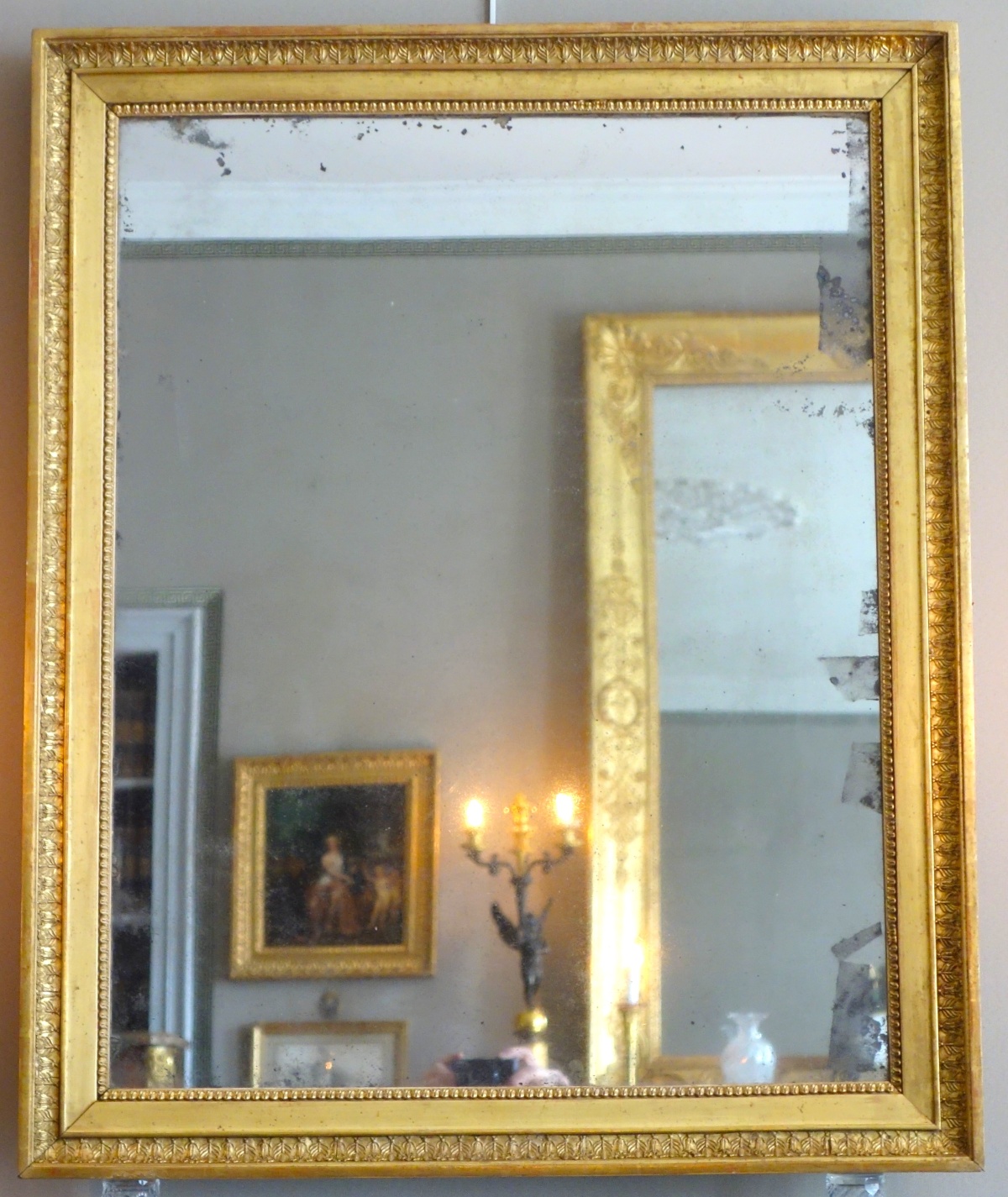 Détail — Miroir en bois doré feuille d'or et glace au mercure, époque Empire - 88cm x 72cm